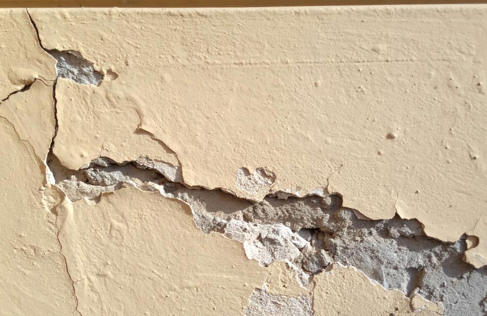 Cracked interior wall showing a construction workmanship defect