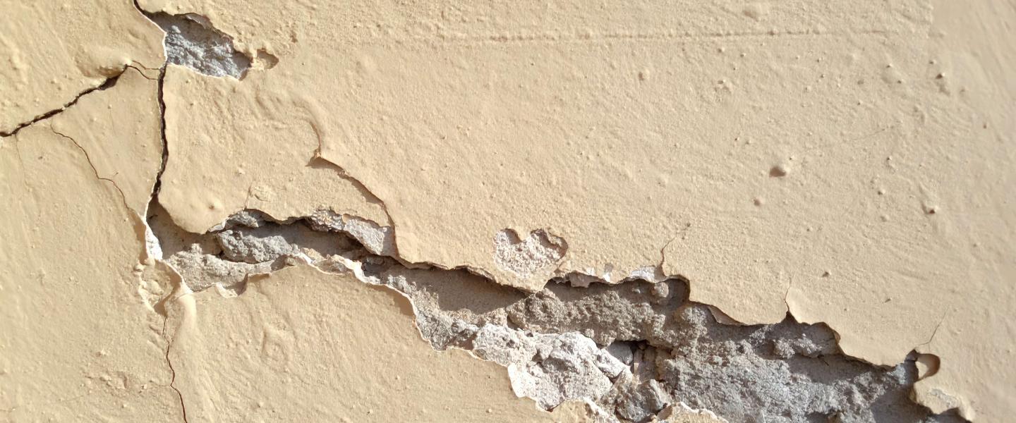 Cracked interior wall showing a construction workmanship defect